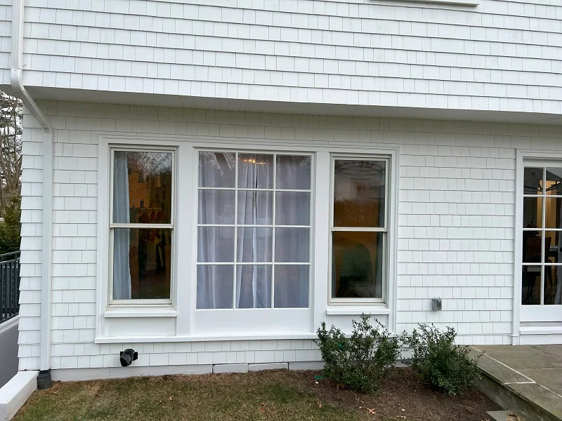 Outdated aluminum windows which allow for cold air to enter the home